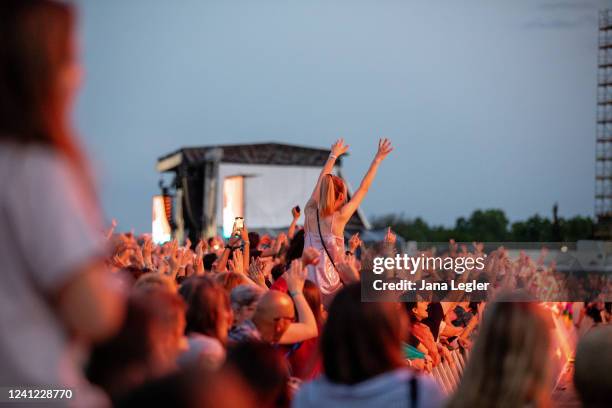 Audience at the Florence & The Machine show during Tempelhof Sounds at Tempelhof Airport on June 10, 2022 in Berlin, Germany.