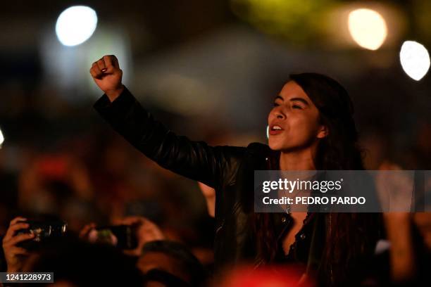 Fan of Cuban singer Silvio Rodriguez attends his concert in the Zocalo square in Mexico City, on June 10, 2022.