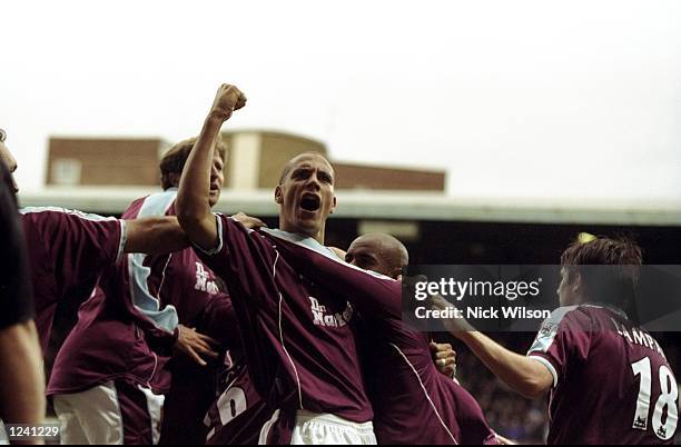 Rio Ferdinand celebrates West Ham United's late equaliser against Sunderland in the FA Carling Premiership match at Upton Park in London. The game...