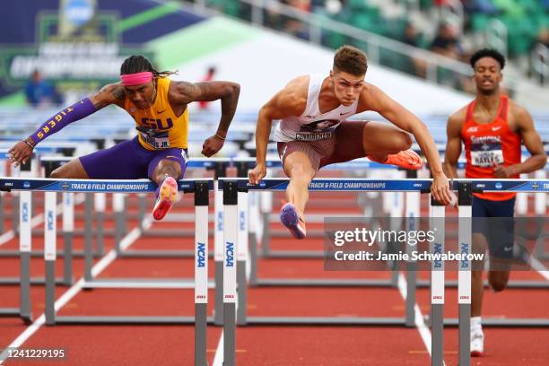 Trey Cunningham of Florida State Seminoles and Eric Edwards of LSU Tigers competes in the mens 110 hurdles during the Division I Men's and Women's...