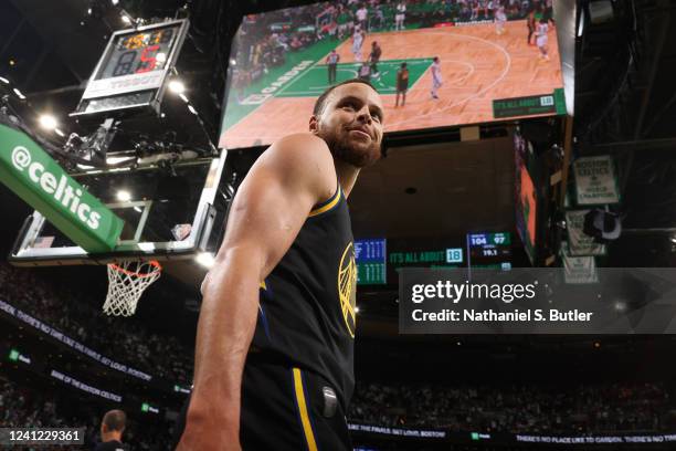 Stephen Curry of the Golden State Warriors looks on and smiles during Game Four of the 2022 NBA Finals on June 10, 2022 at TD Garden in Boston,...