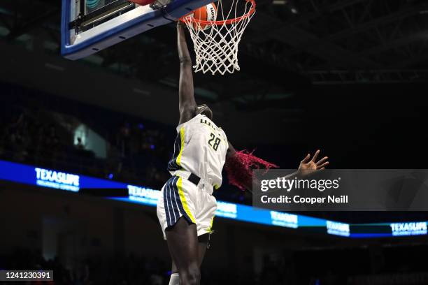 Awak Kuier of the Dallas Wings dunks the ball during the game against the Seattle Storm on June 10, 2022 at College Park Center in Arlington, TX....