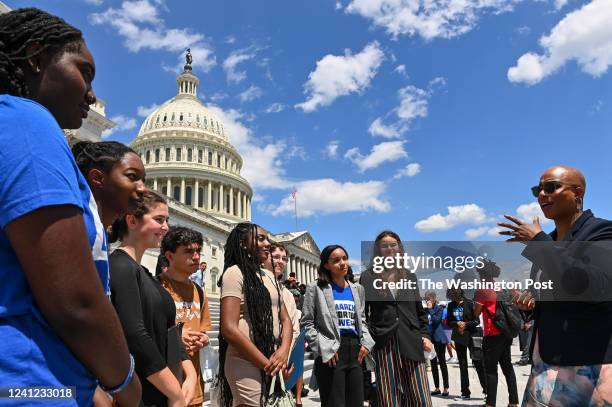 Zoe Touray of Oxford, Michigan, far left, and members of the March For Our Lives movement, speak to Rep. Ayanna Pressley far right, outside the U.S....