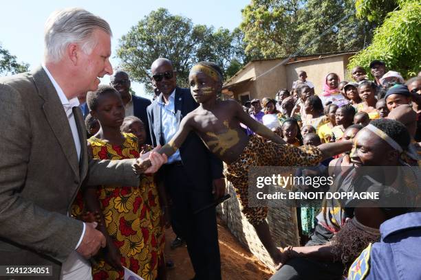 King Philippe - Filip of Belgium greets some locals on their way from Katanga village to their hotel, in Lubumbashi, during an official visit of the...