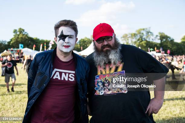 Festival goers get face paint to look like KISS on Day 1 of Download festival at Donnington Park on June 10, 2022 in Donnington, England.