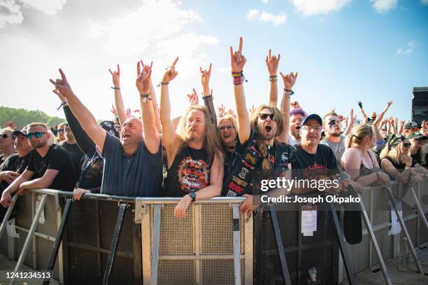 Festival goers enjoy the music on Day 1 of Download festival at Donnington Park on June 10, 2022 in Donnington, England.