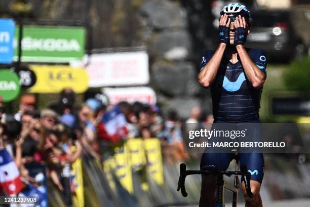 Movistar team's Spanish rider Carlos Verona celebrates as he crosses the finish line at the end of the seventh stage of the 74th edition of the...