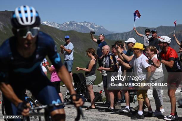 Supporters cheer the riders at Col de la Croix de Fer during the seventh stage of the 74th edition of the Criterium du Dauphine cycling race, 135kms...