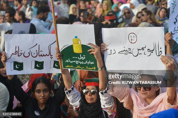 Women activists of Pakistan Tehreek-e-Insaf takes part of protest against inflation in the country in Karachi on June 11, 2022.