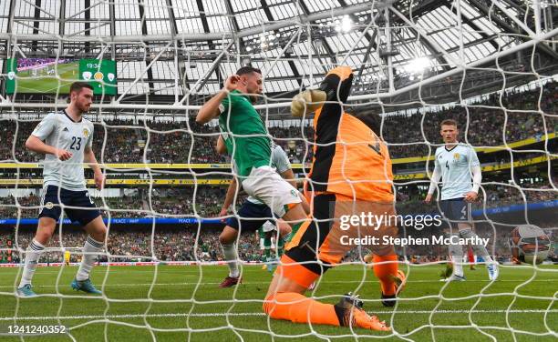 Dublin , Ireland - 11 June 2022; Alan Browne of Republic of Ireland scores his side's first goal past Scotland goalkeeper Craig Gordon during the...