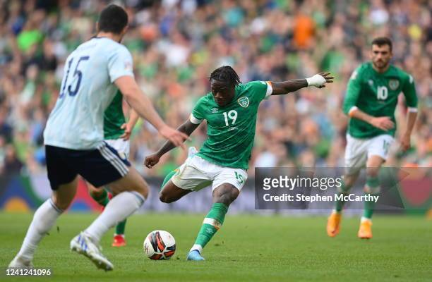 Dublin , Ireland - 11 June 2022; Michael Obafemi of Republic of Ireland scores his side's third goal during the UEFA Nations League B group 1 match...