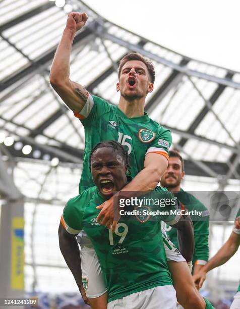 Dublin , Ireland - 11 June 2022; Michael Obafemi of Republic of Ireland celebrates with Jayson Molumby after scoring their side's third goal during...