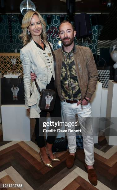Lady Victoria Hervey and Scott Henshall attend the Scott Henshall presentation during London Fashion Week June 2022 at Raffles on June 11, 2022 in...