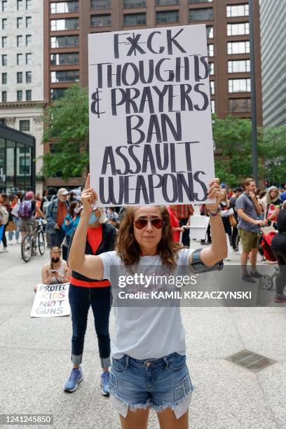 Demonstrators join the "March for Our Lives" rally in Chicago on June 11, 2022. - Protesters are demonstrating across the US for tighter firearms...