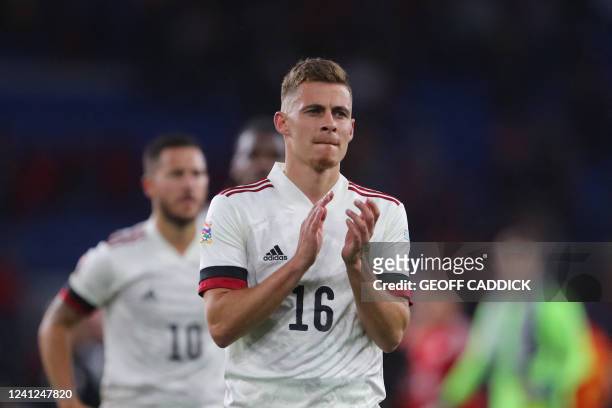 Belgium's midfielder Thorgan Hazard, next to his brother, Belgium's midfielder Eden Hazard , applauds at the end of the UEFA Nations League, league A...