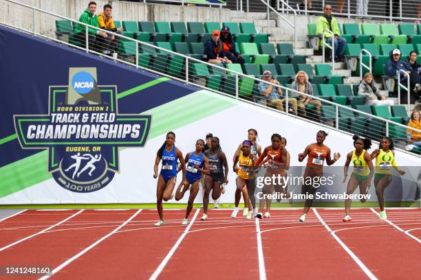 Competitors pass the baton during the womens 4x100 meter relay finals during the Division I Men's and Women's Outdoor Track & Field Championships...