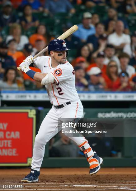 Houston Astros third baseman Alex Bregman watches the pitch in the bottom of the first inning during the baseball game between the Miami Marlins and...