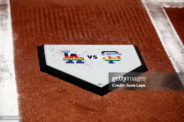 Detailed view of a ceremonial home plate with Pride logos prior to the game between the Los Angeles Dodgers and the San Francisco Giants at Oracle...