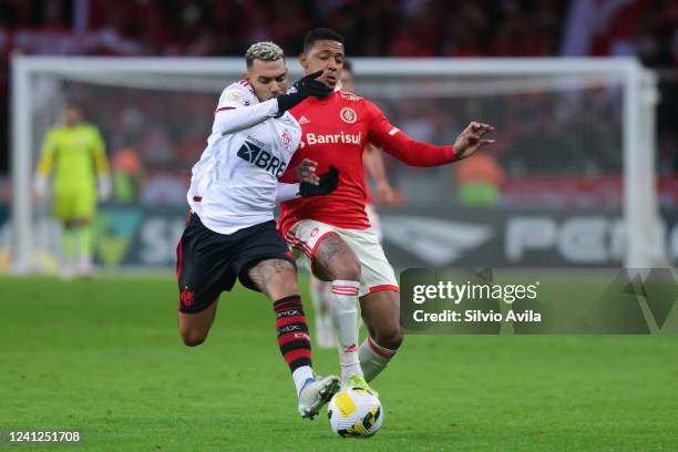 Matheuzinho of Flamengo and David of Internacional fight for the ball during the match between Internacional and Flamengo as part of Brasileirao...