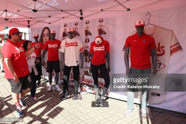 Fans browse a City Connect activation prior to the game between the New York Mets and the Los Angeles Angels at Angel Stadium on Saturday, June 11,...