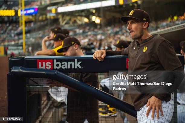 Quality Coach Ryan Flaherty of the San Diego Padres looks on against the Colorado Rockies during game two of a double header on June 11, 2022 at...