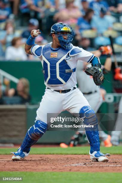 Kansas City Royals catcher Salvador Perez throws to second base during warmups against the Baltimore Orioles on June 9th, 2022 at Kauffman Stadium in...