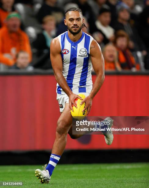 Aaron Hall of the Kangaroos in action during the 2022 AFL Round 13 match between the North Melbourne Kangaroos and the GWS Giants at Marvel Stadium...