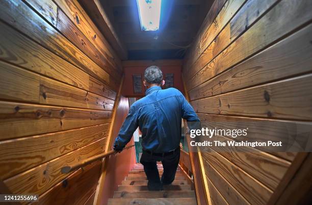 Alva Daniels, Sr. Makes his way down to the basement of his home in Joneville, Virginia on December 12 , 2021. The basement is where his son Alva...