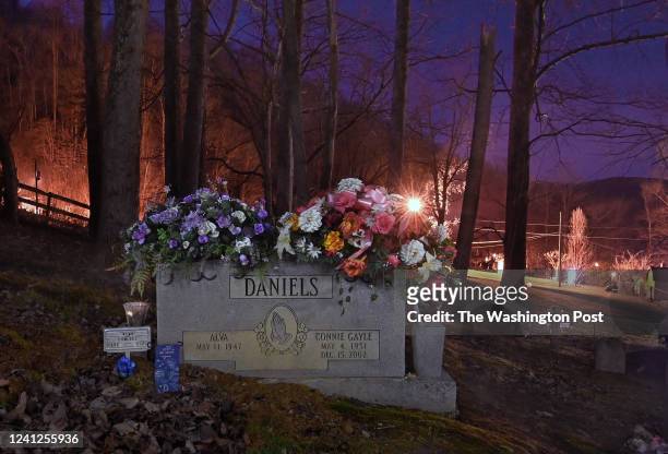 The grave of Alva Daniels sits in a small cemetery in Evarts, Kentucky on December 12 , 2021. Daniels told his wife that he wanted to be buried next...