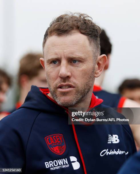 Mark Corrigan, Senior Coach of the Demons looks on during the 2022 VFL Round 12 match between the Casey Demons and the Collingwood Magpies at Casey...