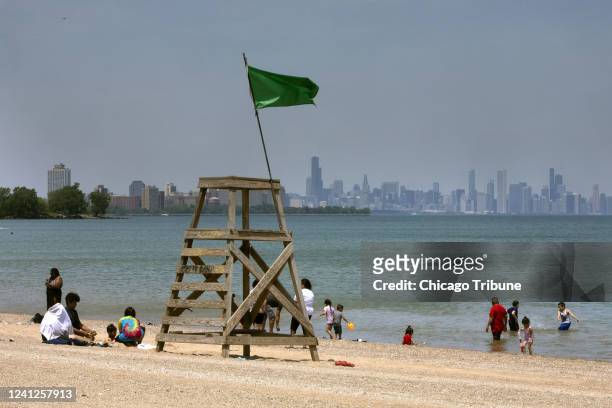 People gather at Rainbow Beach on a hot Memorial Day in the South Shore neighborhood of Chicago, Illinois.
