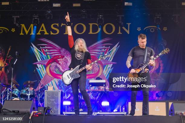 Bassist Troy Sanders and Guitarist Bill Kelliher of Mastodon perform on Day 2 of Download festival at Donnington Park on June 11, 2022 in Donnington,...