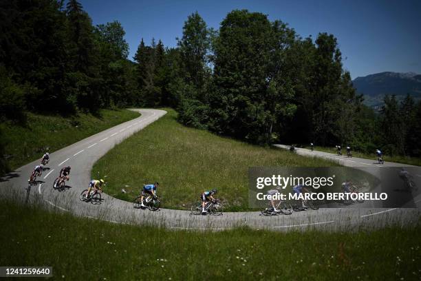 The pack descend during the eighth stage of the 74th edition of the Criterium du Dauphine cycling race, 137.5 km between Saint-Alban-Leysse and...