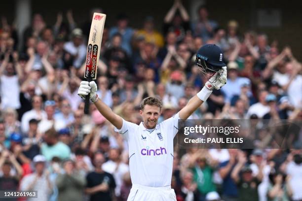 England's Joe Root celebrates after scoring a century on day 3 of the second Test cricket match between England and New Zealand at Trent Bridge...