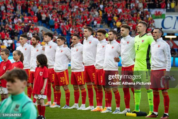 Players of Wales sing the national anthem during the UEFA Nations League match between Wales and Belgium at Cardiff City Stadium on June 11, 2022 in...