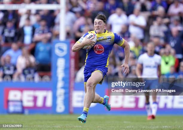 Warrington Wolves' Matty Ashton breaks free to go on and score their side's fourth try during the Betfred Super League match at the Be Well Support...