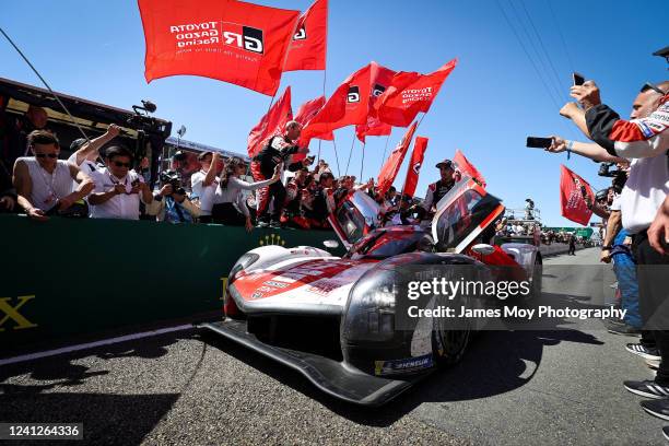 Race winners the Toyota Gazoo Racing GR010 Hybrid of Sebastien Buemi, Brendon Hartley, and Ryo Hirakawa celebrate at the end of the Le Mans 24 Hours...