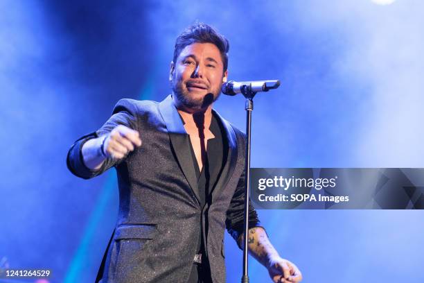 Singer Miguel Poveda performs during his concert, framed in 'Las Noches del Botánico', at the Real Jardín Botánico in Madrid.