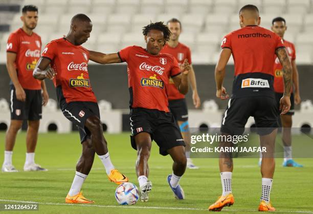 Peru's players take part in a training session at the Jassim bin Hamad stadium in the Qatari capital Doha on June 12 on the eve of their FIFA World...