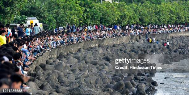 Crowd gather at Marine Drives, on June 12, 2022 in Mumbai, India.