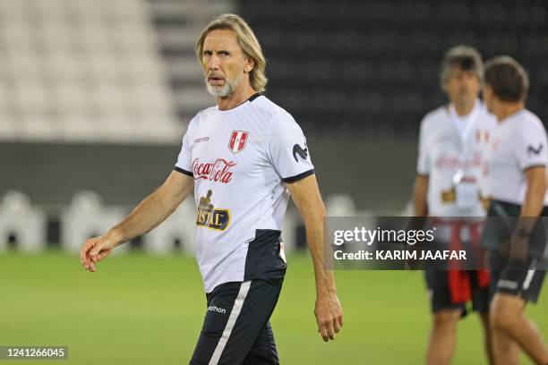 Peru's coach Ricardo Gareca attends a training session at the Jassim bin Hamad stadium in the Qatari capital Doha on June 12 on the eve of their FIFA...