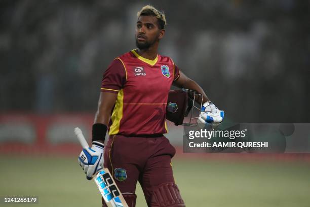 West Indies' captain Nicholas Pooran walks back to pavilion after his dismissal during the third and final one-day international cricket match...