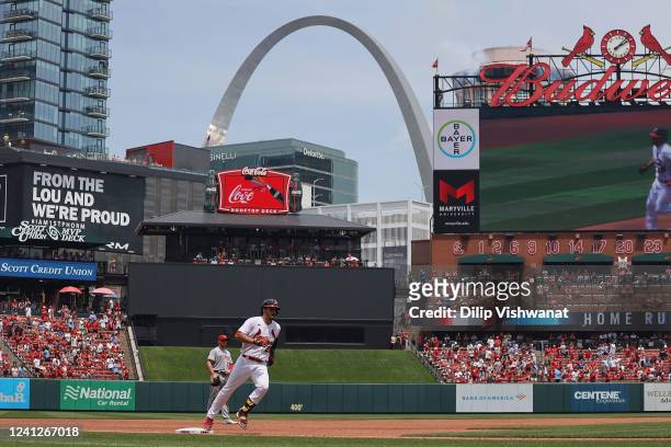 Nolan Arenado of the St. Louis Cardinals rounds third base after hitting a two-run home run against the Cincinnati Reds in the third inning at Busch...