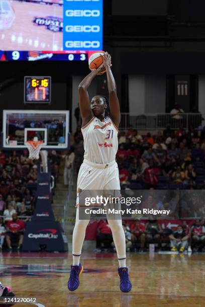 Tina Charles of the Phoenix Mercury shoots a three point basket during the game against the Washington Mystics on June 12, 2022 at Entertainment &...