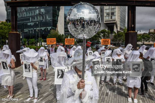 Protest group called "Gays Against Guns" performs in honor of victims of gun violence on June 12, 2022 in New York City. Every year on June 12th,...