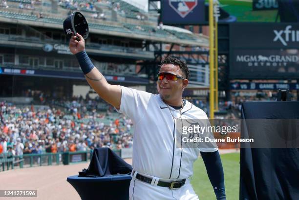 Miguel Cabrera of the Detroit Tigers waves to the fans as he is introduced during a celebration of his 3,000 hits before a game against the Toronto...