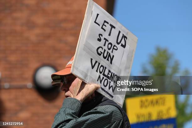 Protester holds a placard at a March for Our Lives rally at the Columbia County Courthouse. The rally was one of hundreds held across the United...