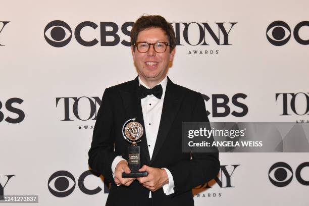 British playwright Ben Power winner of Best Play for "The Lehman Trilogy" poses in the press room at 3 West Club during the 75th annual Tony awards...