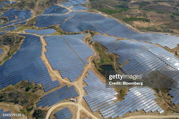 Photovoltaic panels, which form part of the Solara 4 solar park, cover hillsides in Vaqueiros, Faro district, Portugal, on Thursday, June 9, 2022....