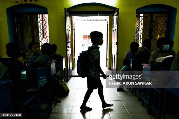 Students attend their class as schools reopened after summer vaccination in Chennai on June 13, 2022.